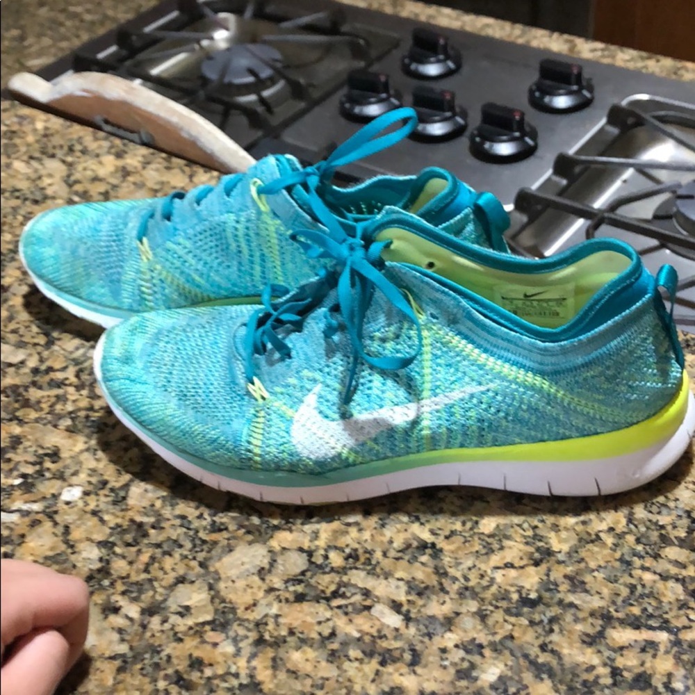 Women’s Nike running shoes blue and neon size 9
